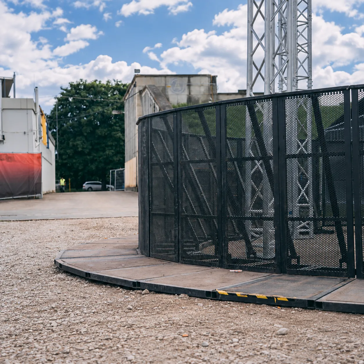 Curved line of black Mojo Barriers on a festival site