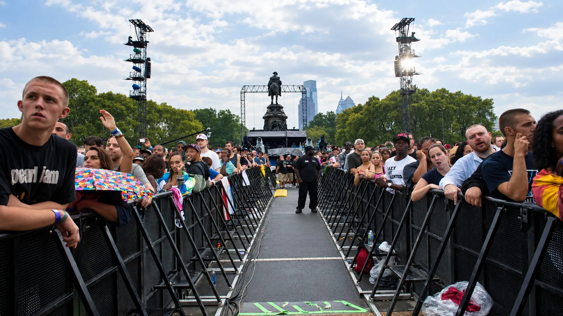 Crowd behind Mojo Barriers at an open-air festival