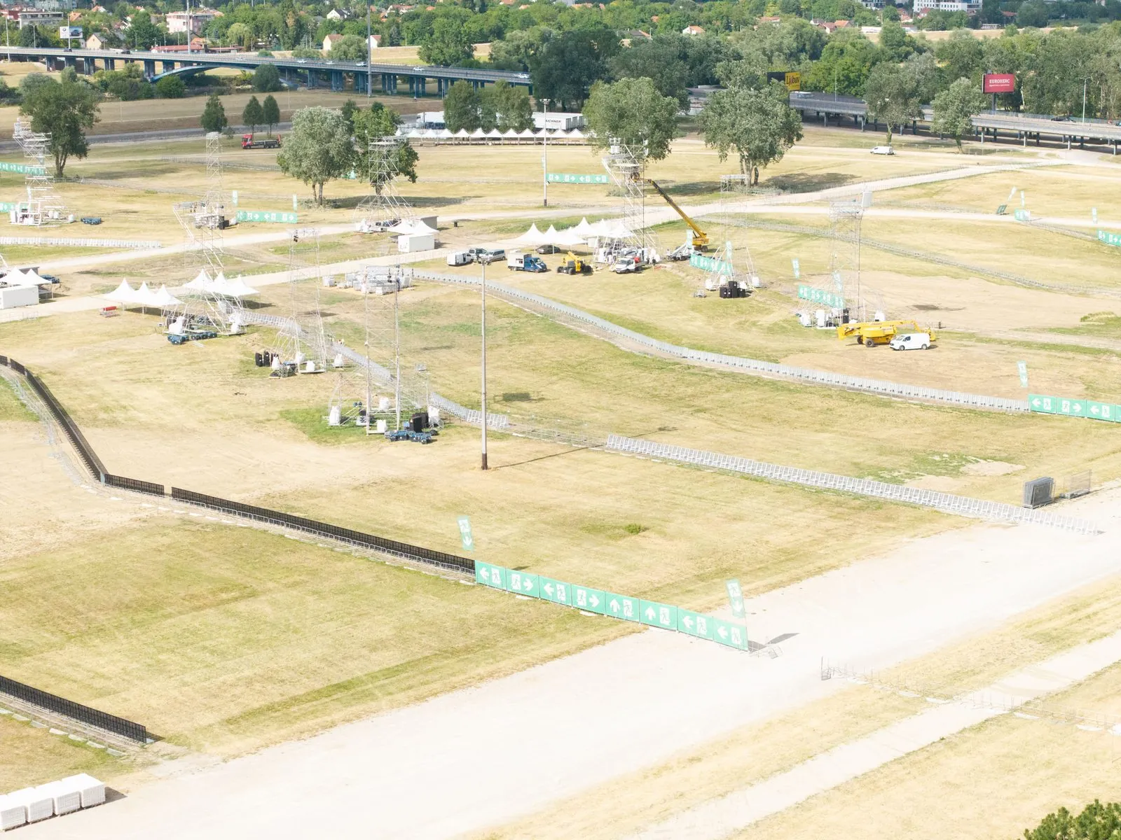Aerial view of a festival site with Mojo Barrier lines