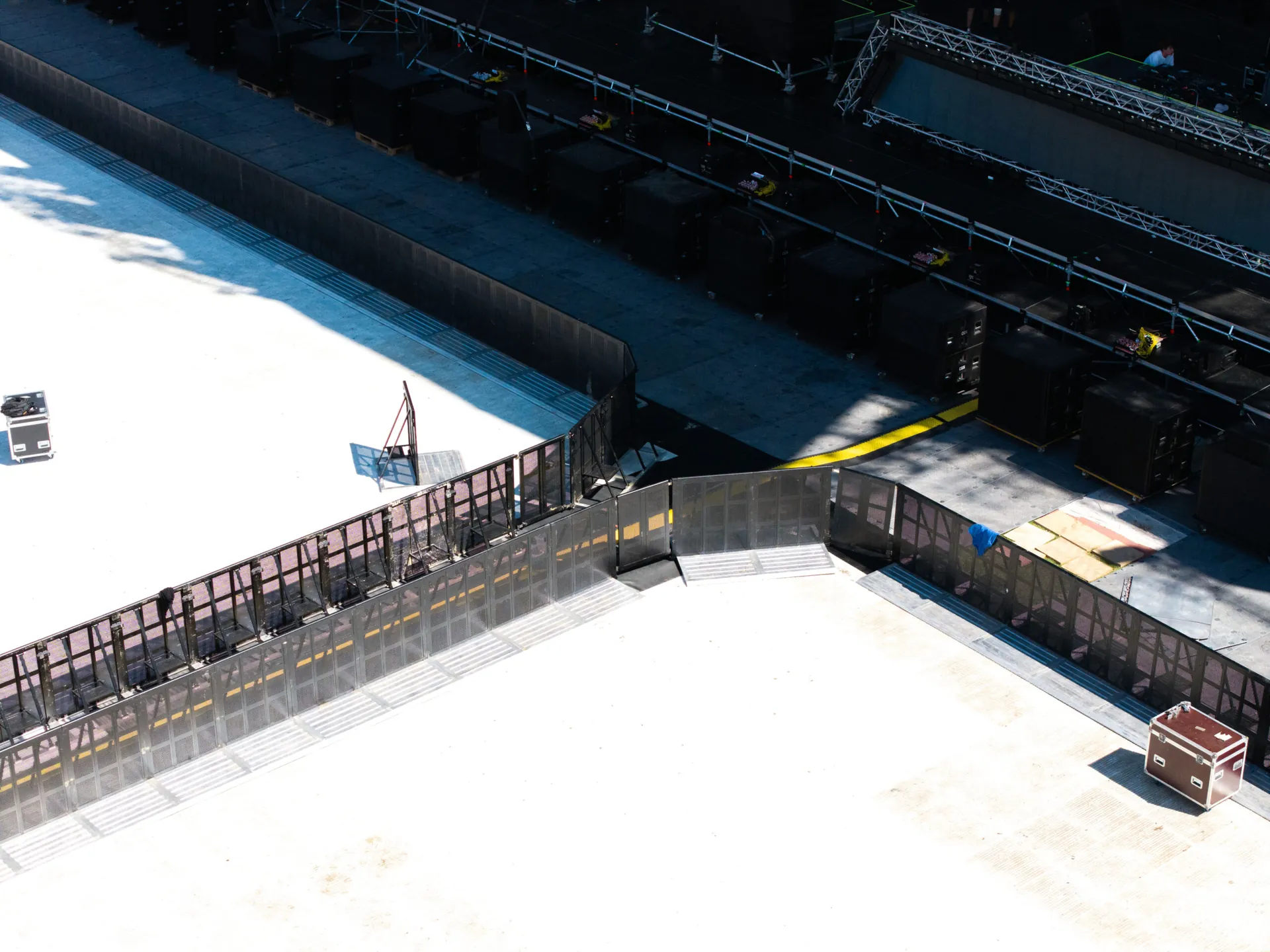 Aerial view of a Mojo Barrier corner in front of a stage