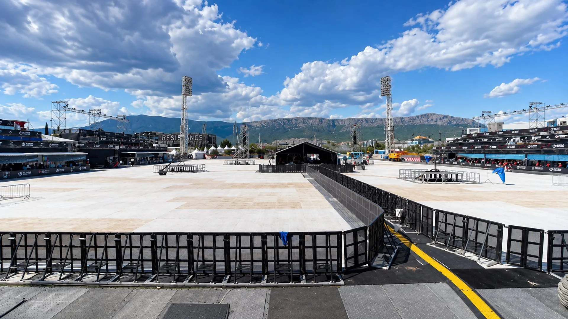 Mojo Barriers at a stadium festival with mountain view