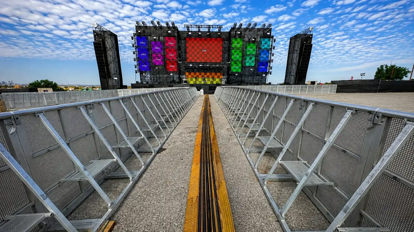 Double Mojo Barrier line in front of a large stage