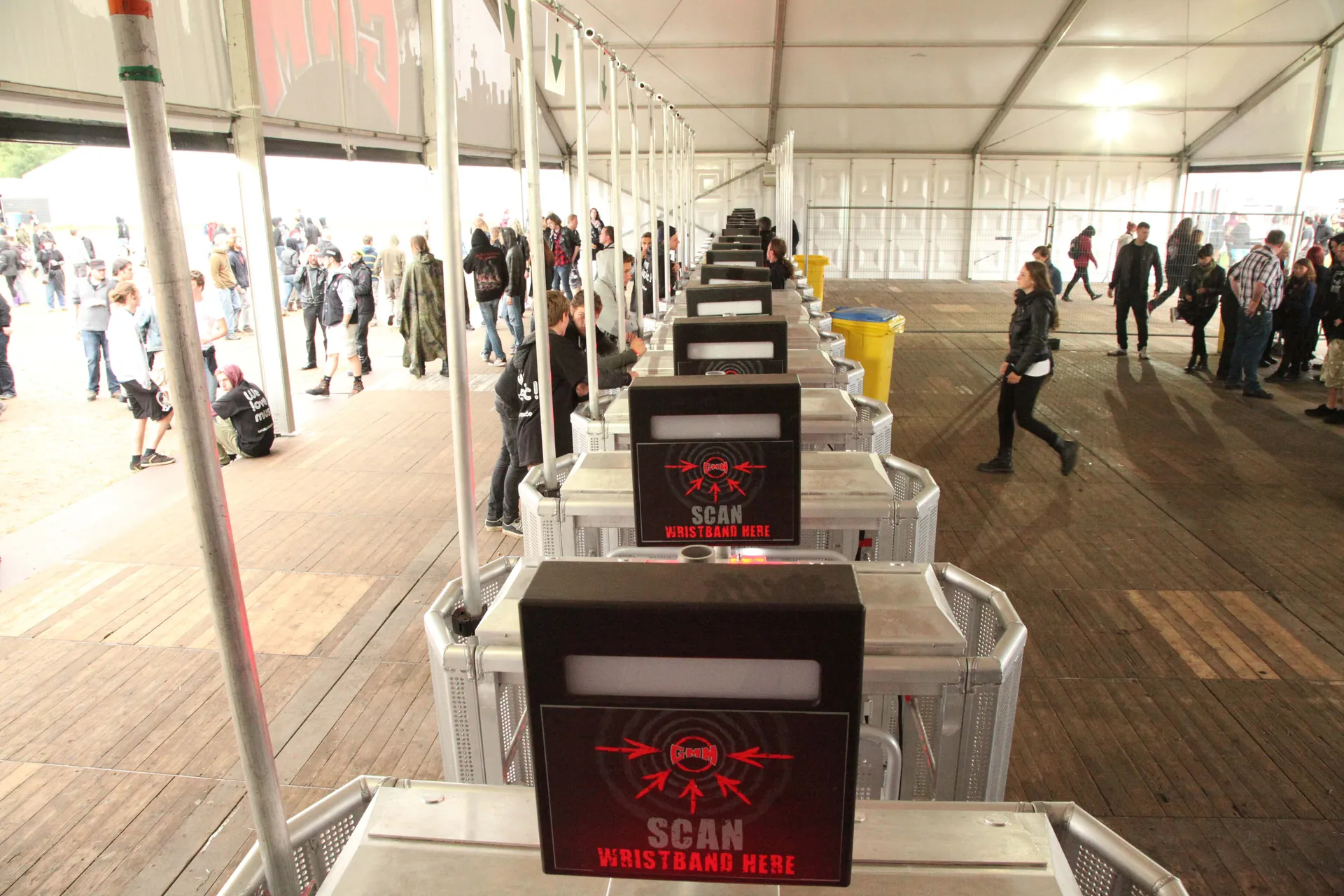Row of Gatekeeper turnstiles with wristband scanners at the entrance of Graspop Festival, 2013
