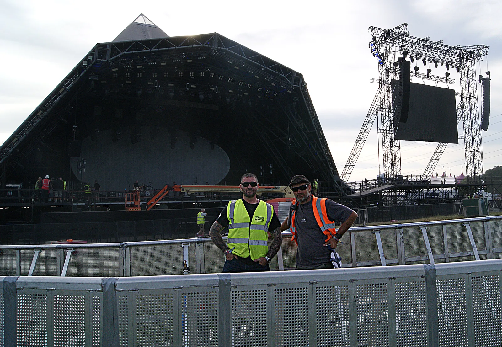 Two aluminium Mojo Barrier lines in front of the Pyramid Stage at Glastonbury Festival 2017 during set-up